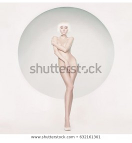 Fashion art studio photo of nude sensual woman with beautiful makeup